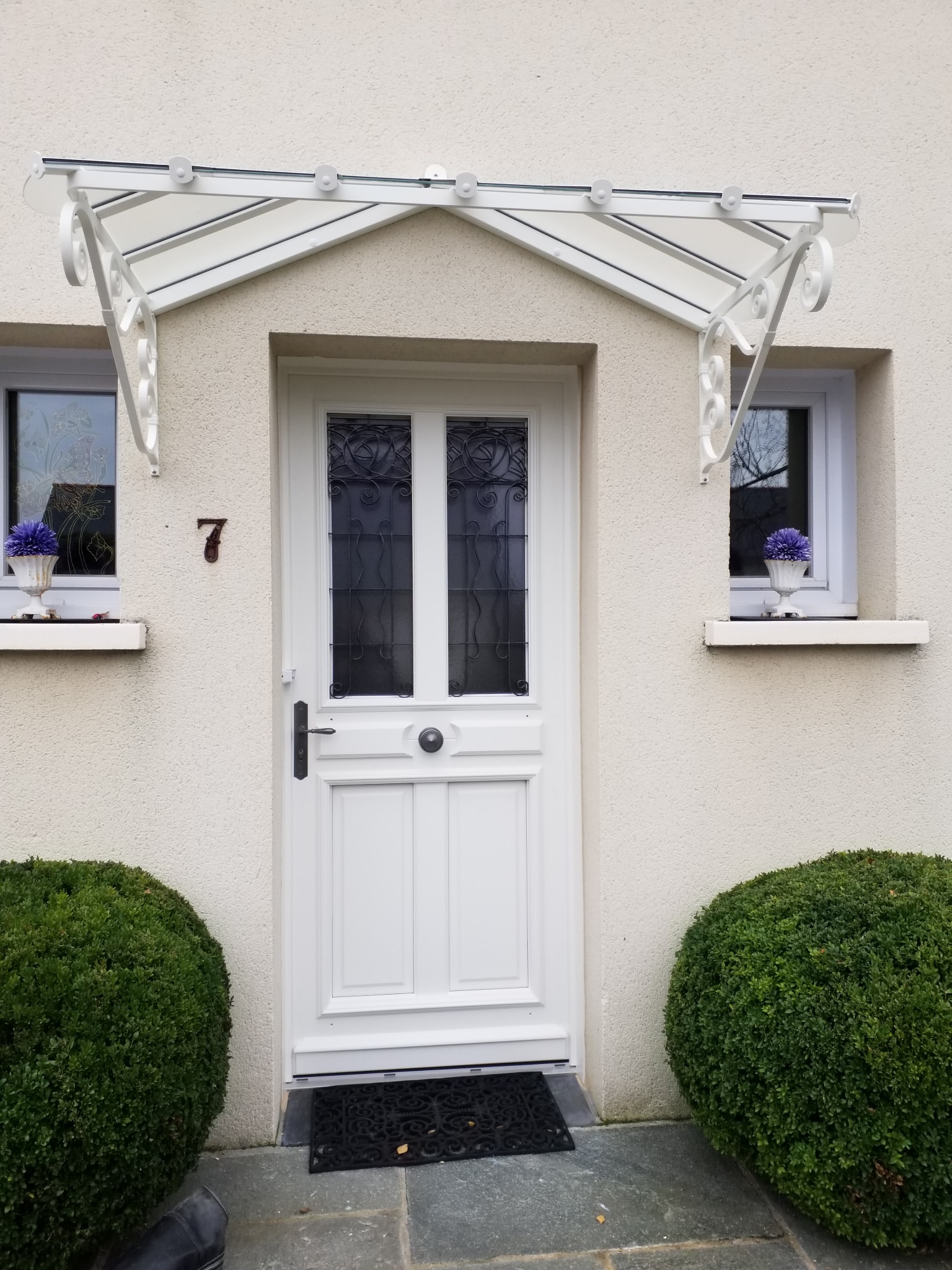 porte d'entrée en bois vitrée